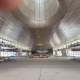 Station interior metallic ceiling and circular skylight